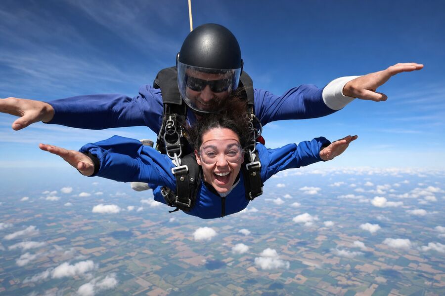Outside-camera shot of a tandem pair in freefall
